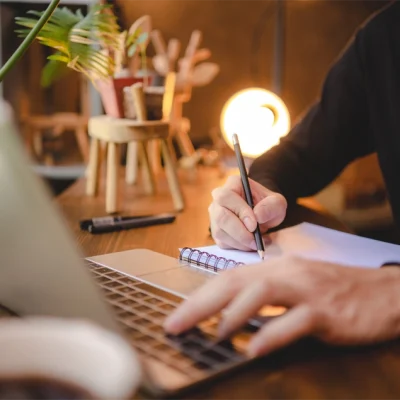 people-hand-holding-a-pen-for-working-to-write-on-a-book-for-letter-or-business-document-copy